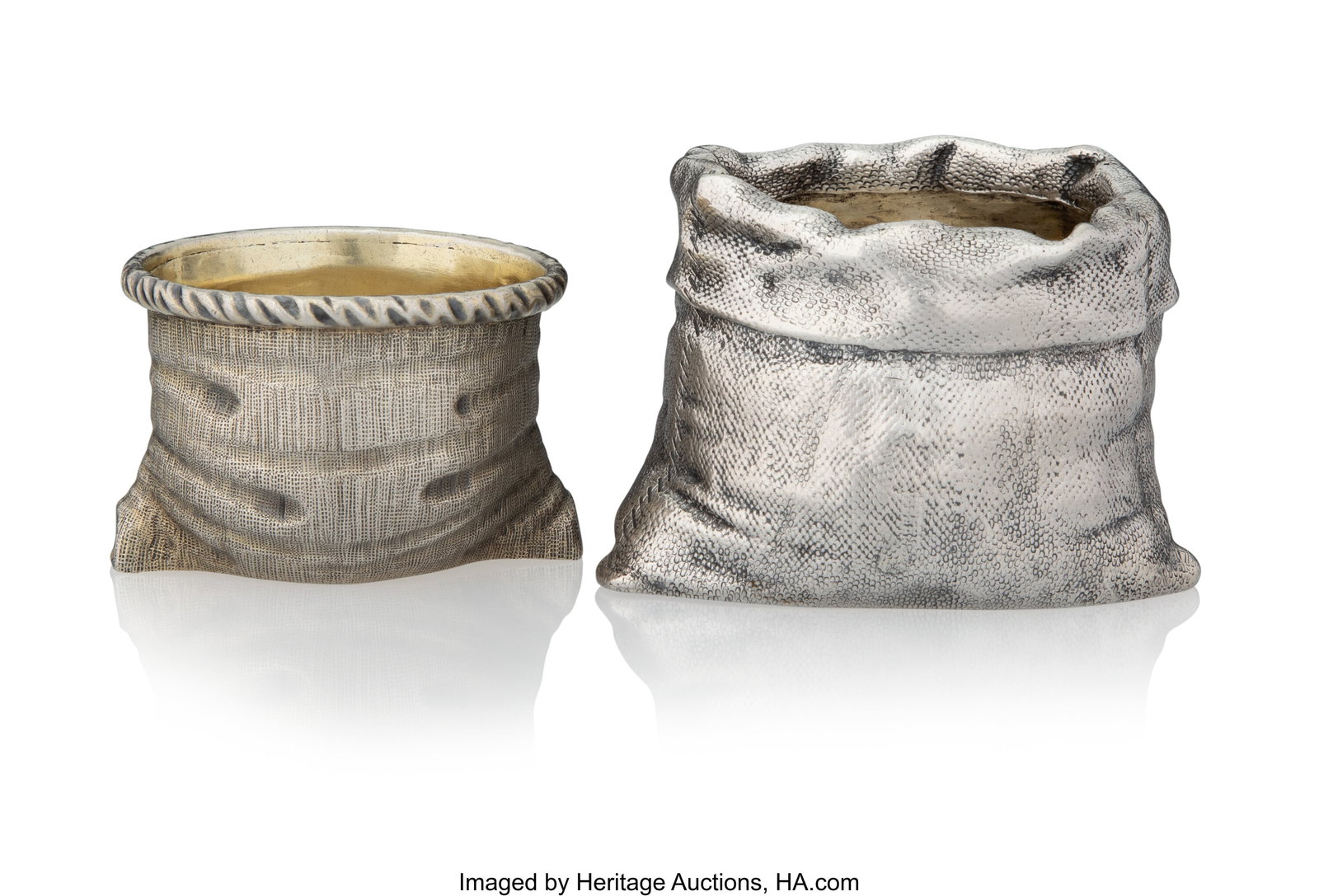 Two Russian Trompe L'oeil Silver Salt Cellars Sa: Two Russian Trompe L'oeil Silver Salt Cellars Sazikov with Imperial Warrant, maker's mark BS, Moscow, 1865 2-1/4 x 3-3/8 x 3-1/2 inches (5.7 x 8.6 x