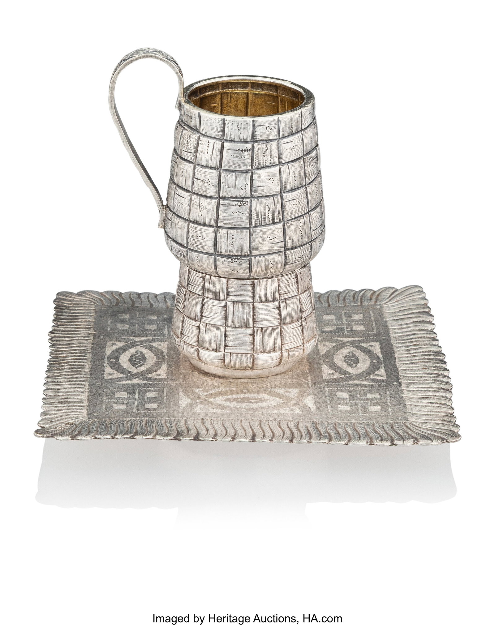 A Russian Trompe L'oeil Silver Vodka Cup and a S: A Russian Trompe L'oeil Silver Vodka Cup and a Salt Cellar The Cup by Semen Kazakov, Moscow, circa 1890 4 x 4-1/4 x 4-1/4 inches (10.2 x 10.8 x 10.8 cm&rp