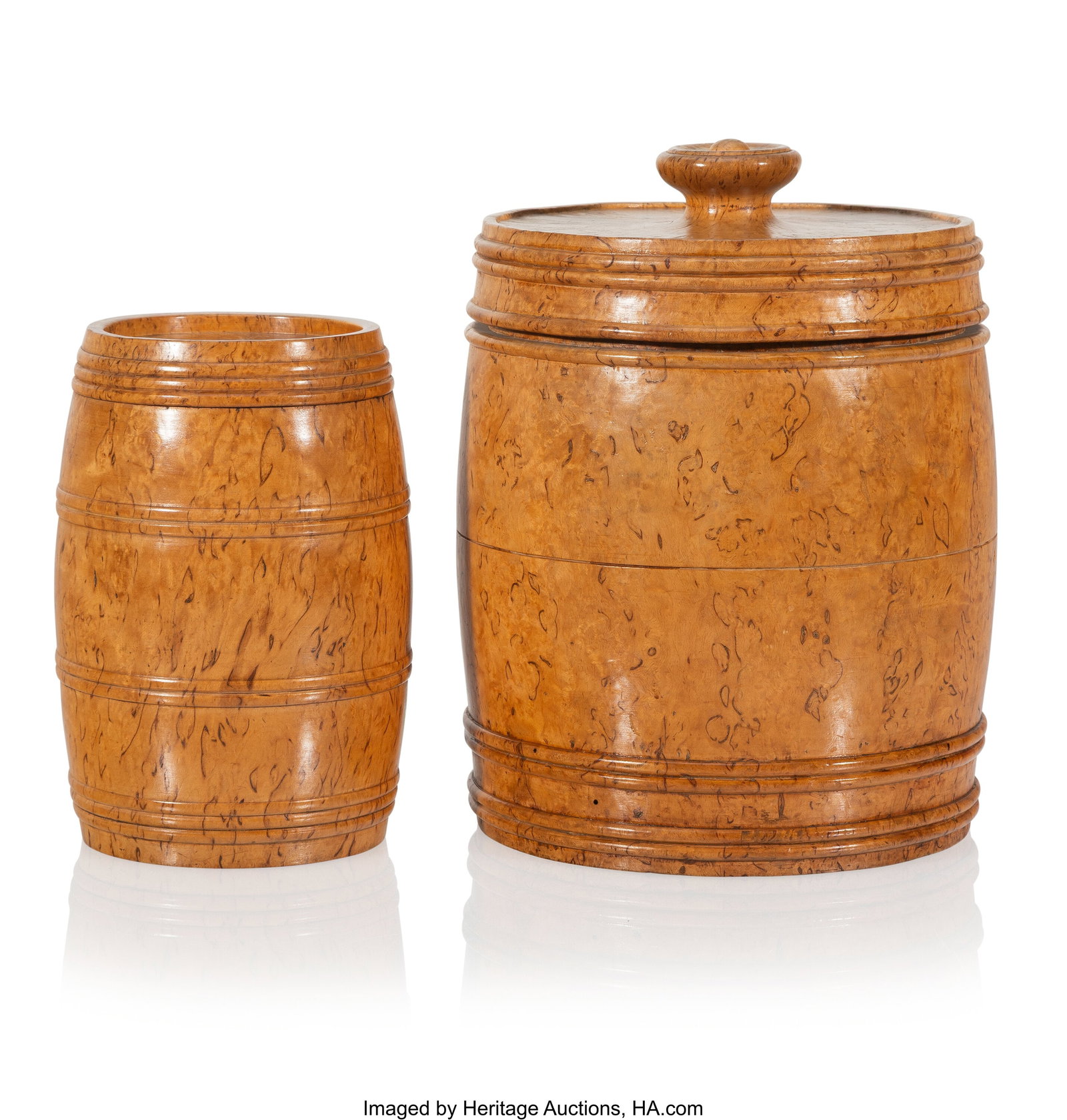 Two Russian Karelian Birchwood Biscuit Barrels c: Two Russian Karelian Birchwood Biscuit Barrels circa 1900 9-1/4 x 7 inches (23.5 x 17.8 cm) (tallest) PROVENANCE: Sotheby's, London, The Russian