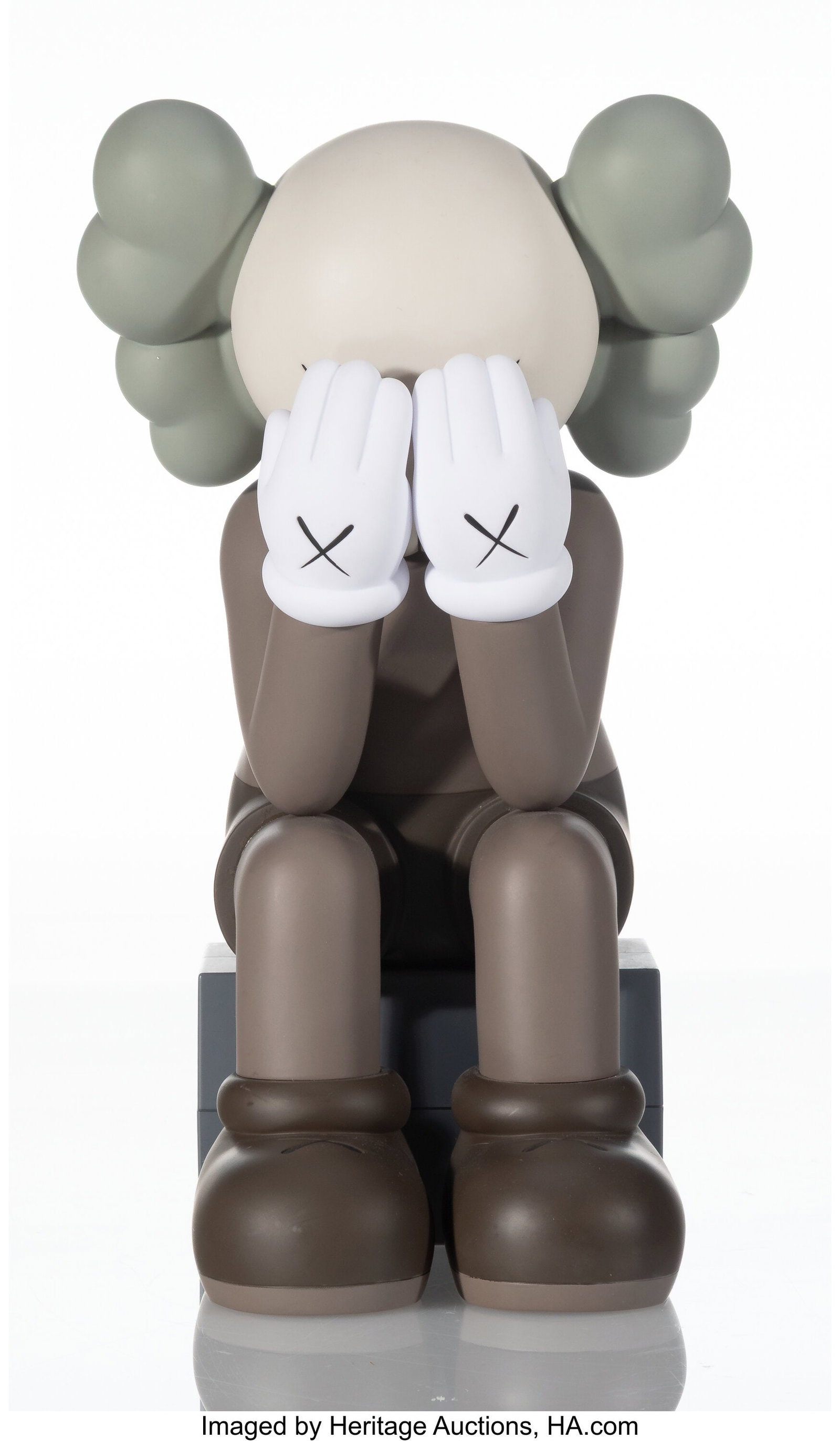 KAWS (b. 1974) Passing Through Companion (Brown) (1 of 3)