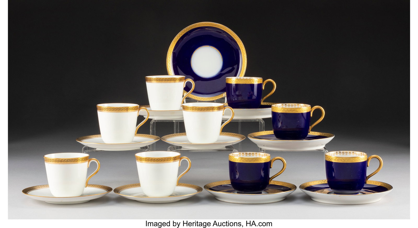 A Collection of Nine Partial Gilt Porcelain Demi: A Collection of Nine Partial Gilt Porcelain Demitasse Cups with Ten Saucers, early 20th century Marks to one: CAULDON LTD, ENGLAND, W.H. PLUMMER 26 WEST 22ND