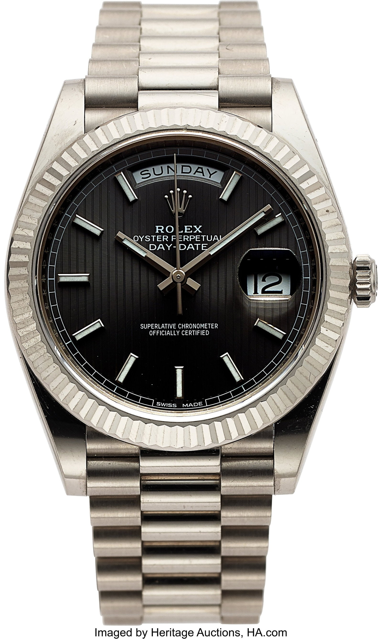 Rolex, Ref. 228239 White Gold Day-Date 40, Rhodi: Rolex, Ref. 228239 White Gold Day-Date 40, Rhodium Stripe Motif Dial, Full Set, circa 2015 Case: 40 mm, 18k white gold case and band, three body,