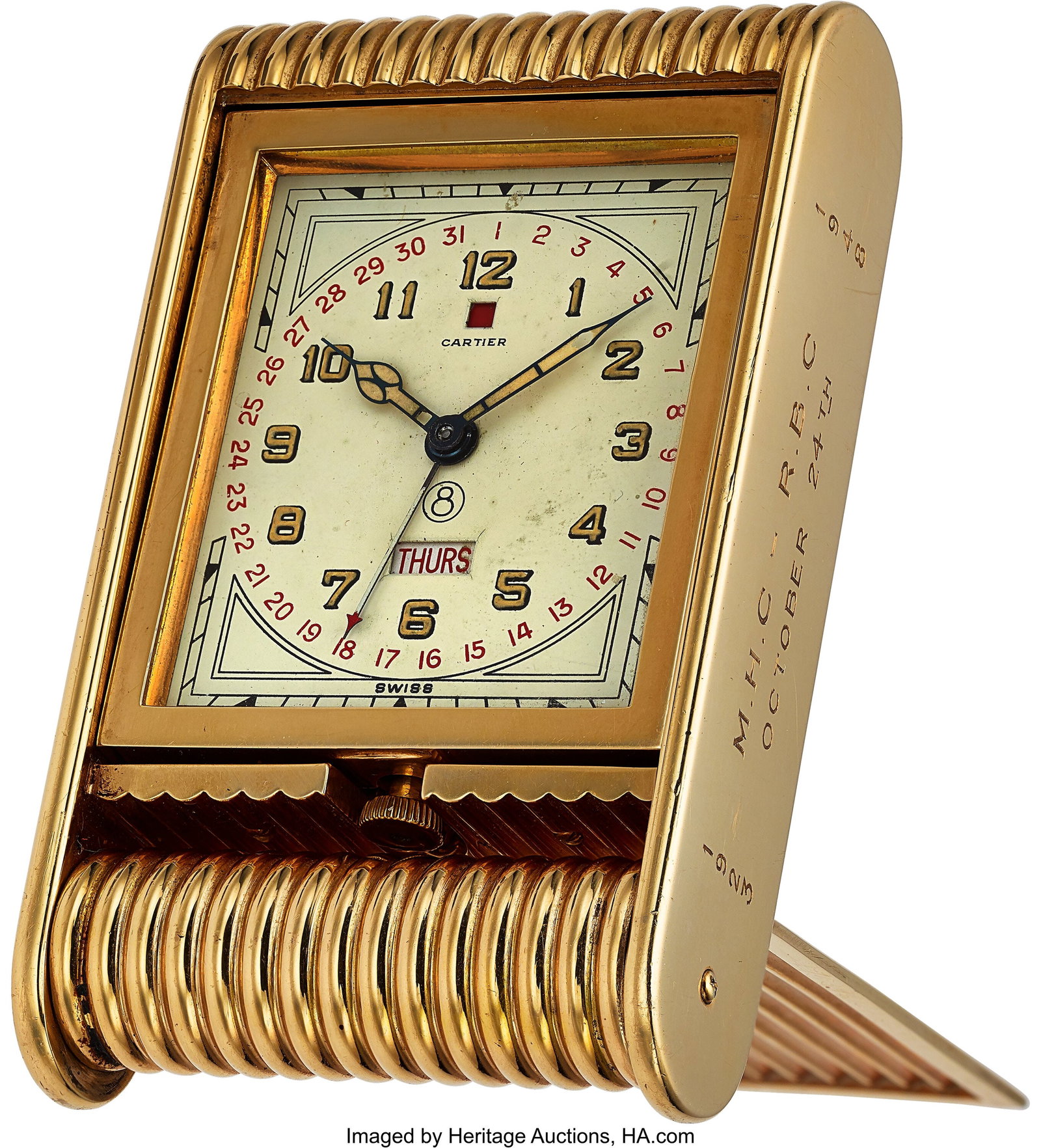 Cartier Very Rare 14k Gold Eight Day Day-Date Tr: Cartier Very Rare 14k Gold Eight Day Day-Date Travel Clock With Power Indication, circa 1940's Case: 90 mm x 53 mm x 20 mm, 14k yellow gold, heavy deeply ribbed rectangular pan
