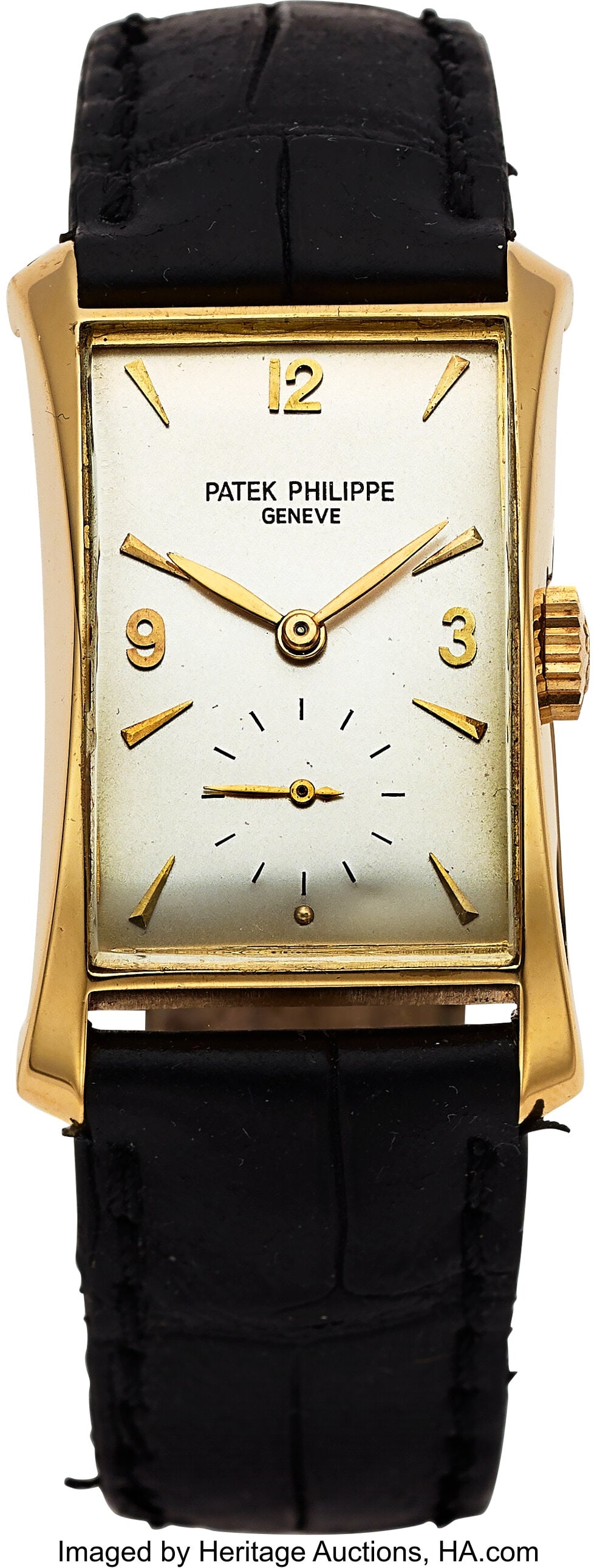 Patek Philippe Hour Glass, 18k Yellow Gold, Ref.: Patek Philippe Hour Glass, 18k Yellow Gold, Ref. 2468 Case: 22 mm x 30 mm, 18k yellow gold, two body, snap-on case back Dial: silvered dial, gold