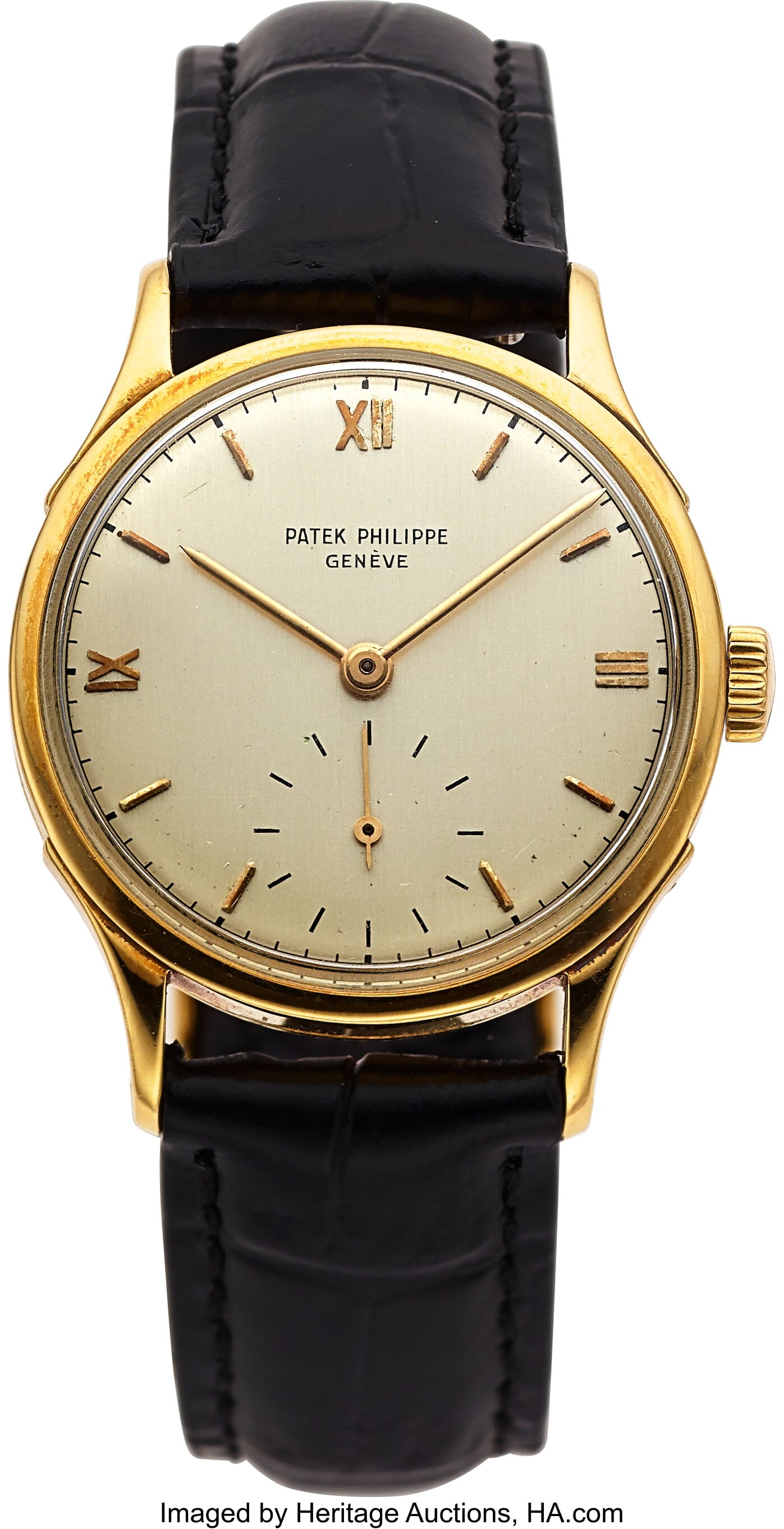 Patek Philippe Calatrava Vintage, 18k Yellow Gol: Patek Philippe Calatrava Vintage, 18k Yellow Gold, Ref. 1516 Case: 32 mm, 18k yellow gold, two body, snap-on case Dial: cream dial, gold line and