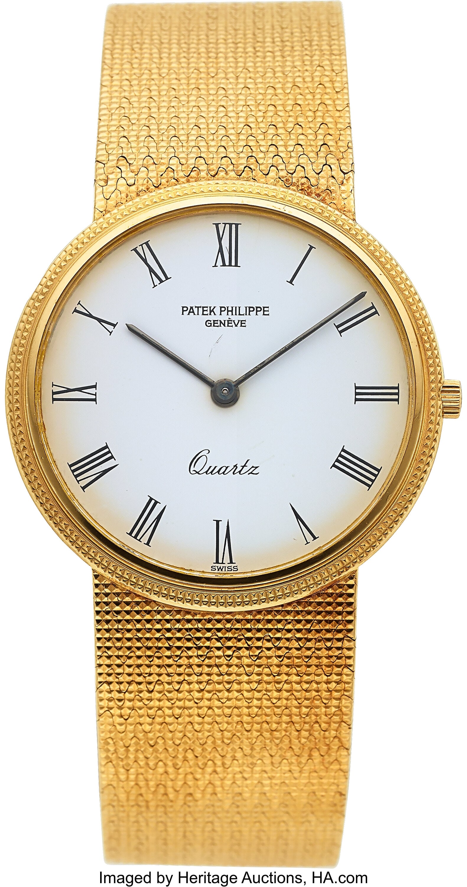 Patek Philippe, 18k Yellow Gold, Quartz, Ref. 37: Patek Philippe, 18k Yellow Gold, Quartz, Ref. 3744 Case: 33 mm, 18k yellow gold, two body, snap-on case back, fixed hobnail bezel,