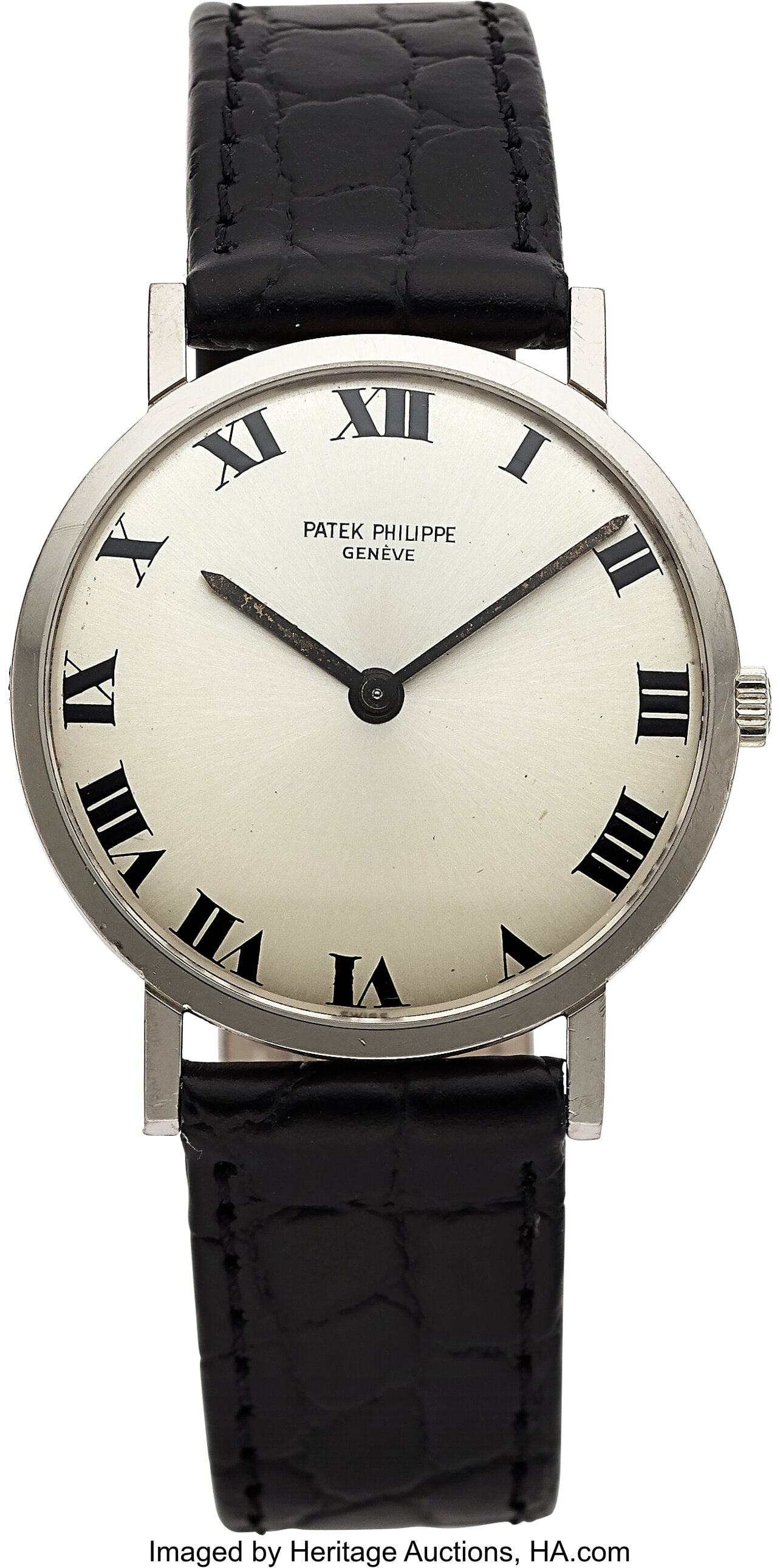 Patek Philippe Calatrava, 18k White Gold, Ref. 3: Patek Philippe Calatrava, 18k White Gold, Ref. 3512G Case: 31 mm, 18k white gold, two body, snap-on case back Dial: silvered sunburst dial, black