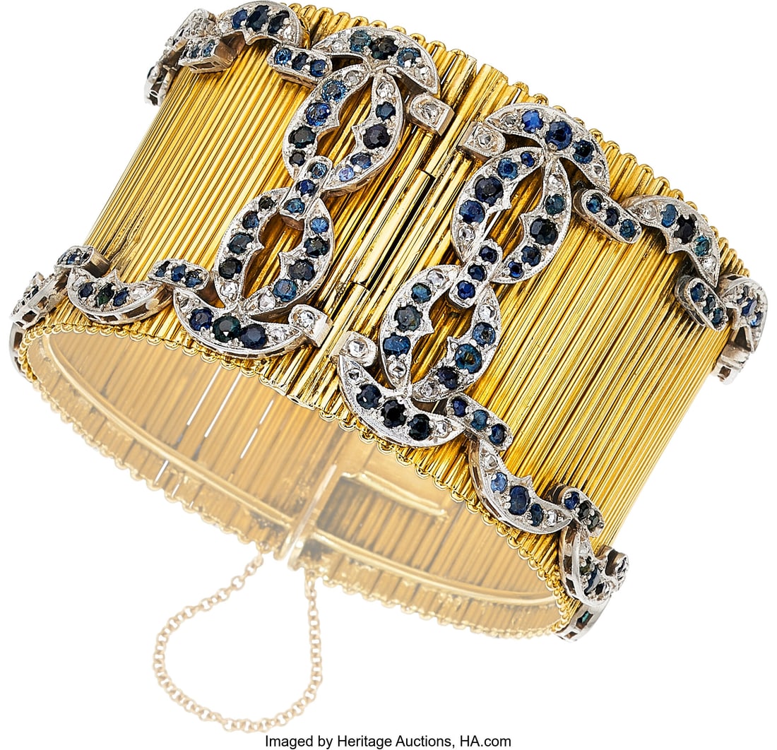 Sapphire, Diamond, Platinum, Gold Bracelet Ston: Sapphire, Diamond, Platinum, Gold Bracelet Stones: Round-shaped sapphires weighing a total of approximately 10.00 carats; rose-cut diamonds Metal: Platinum an