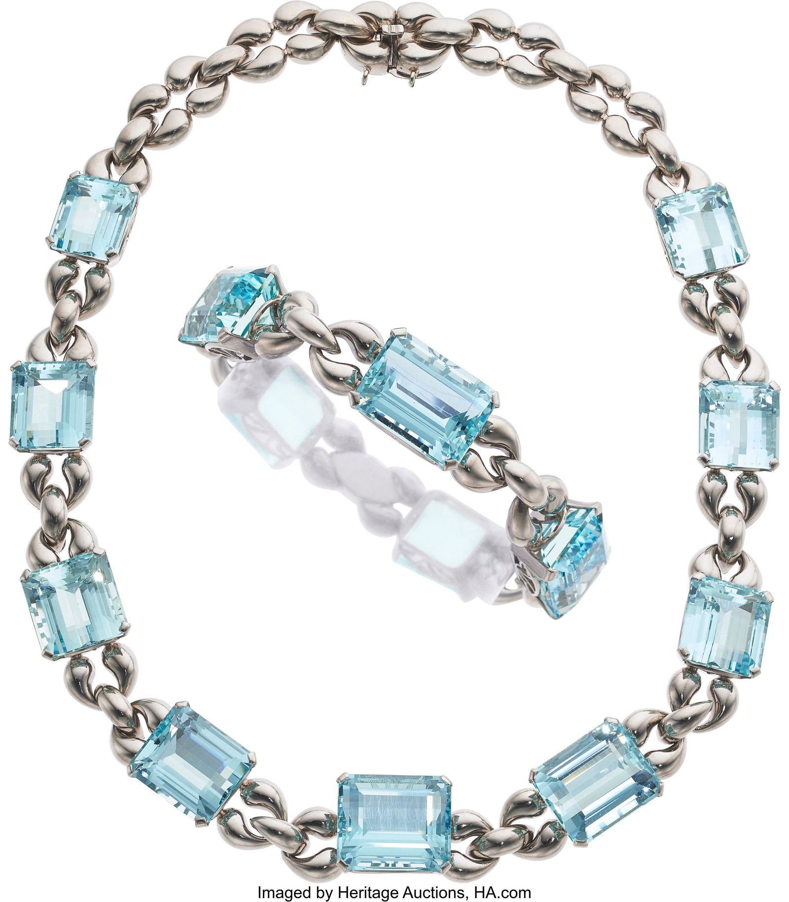 Aquamarine, White Gold Jewelry Suite Stones: Em: Aquamarine, White Gold Jewelry Suite Stones: Emerald-cut aquamarines weighing a total of approximately 193.00 carats Metal: 14k white gold and platinum (safety chain&rpar