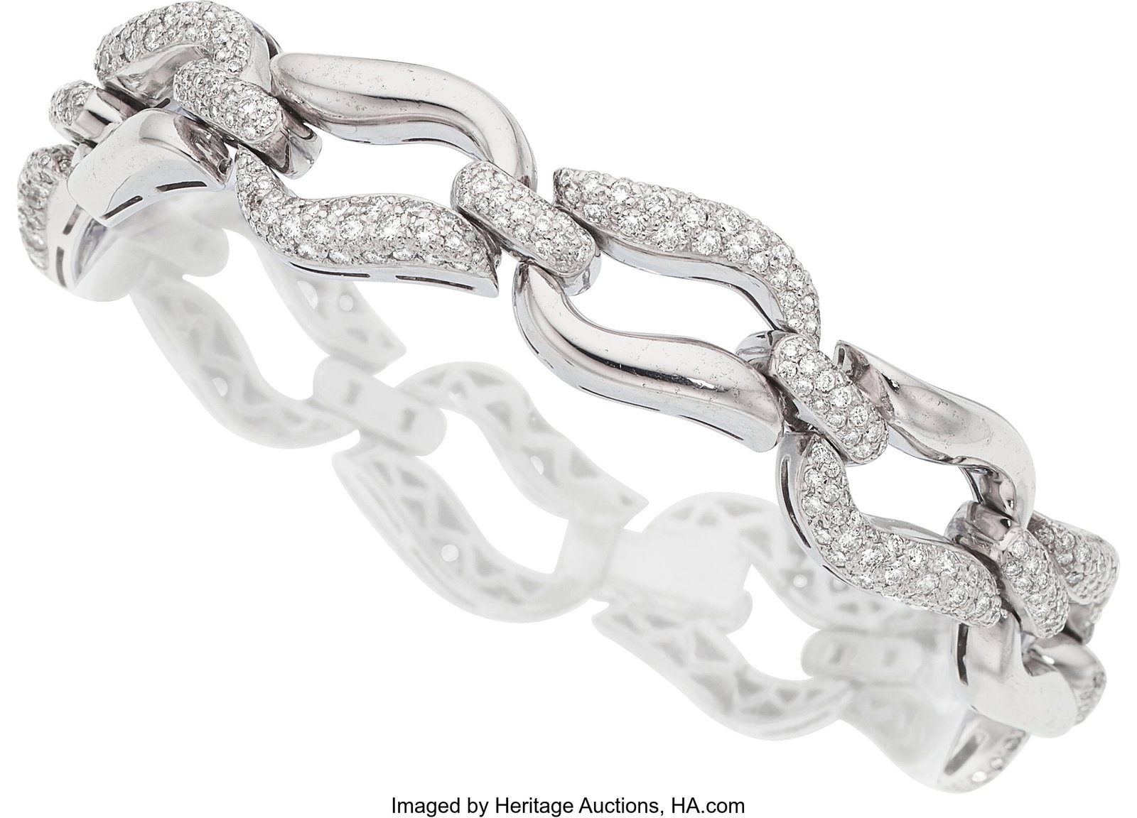 Diamond, White Gold Bracelet Stones: Full-cut d: Diamond, White Gold Bracelet Stones: Full-cut diamonds weighing a total of approximately 3.90 carats Metal: 18k white gold Gross Weight: 57.00 grams Dimensions&co