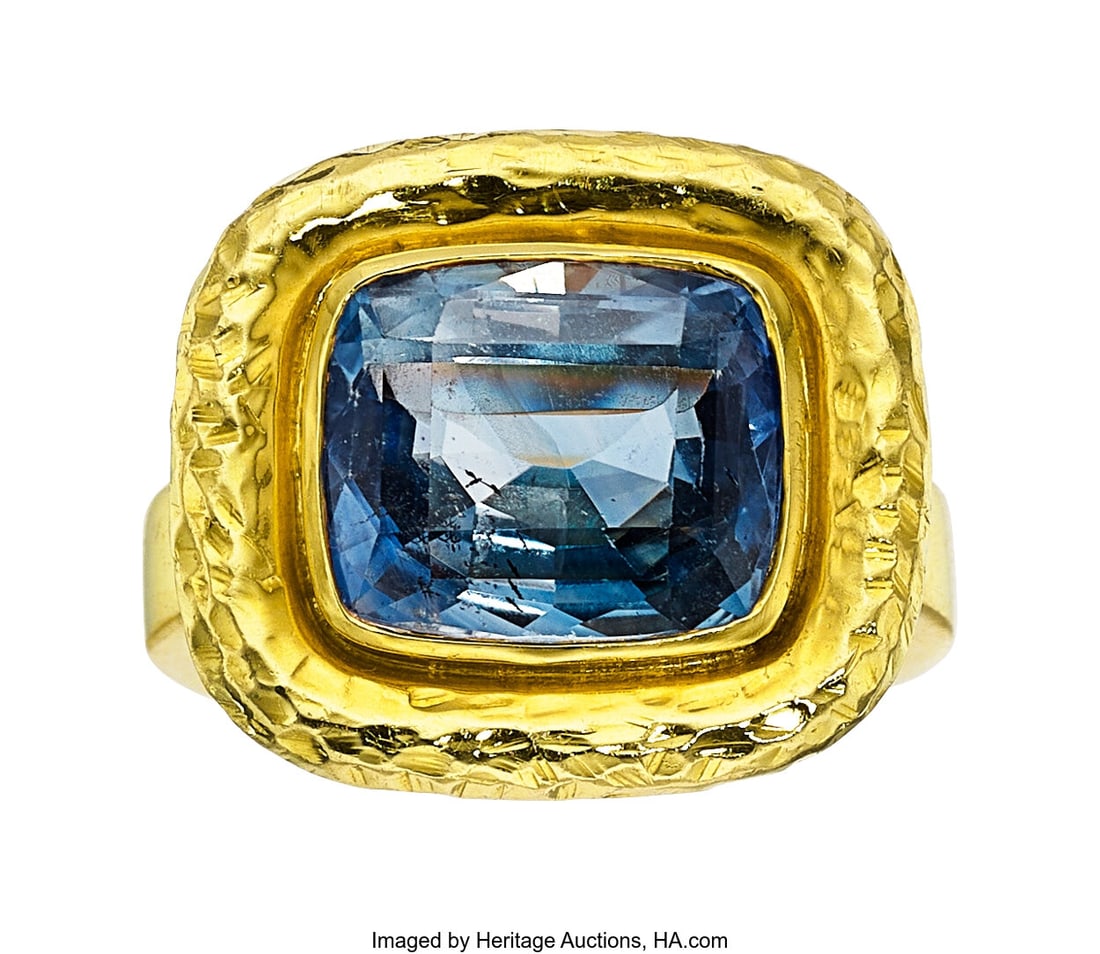Ceylon Sapphire, Gold Ring Stones: Cushion-shap: Ceylon Sapphire, Gold Ring Stones: Cushion-shaped sapphire weighing approximately 4.85 carats Metal: 18k gold Gross Weight: 23.90 grams Size: 9-1/2 &lpa