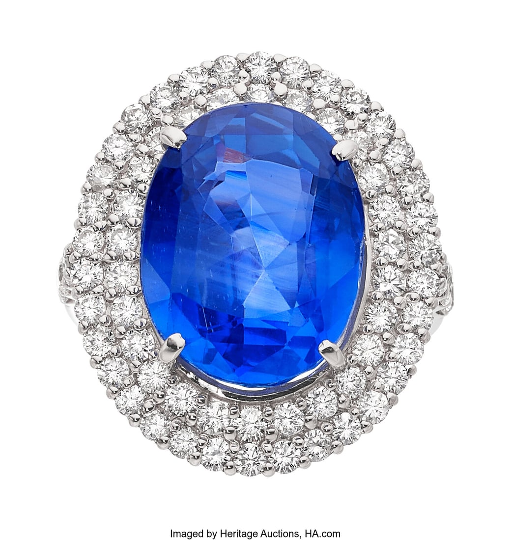 Ceylon Sapphire, Diamond, Platinum Ring Stones:: Ceylon Sapphire, Diamond, Platinum Ring Stones: Oval-shaped sapphire weighing 14.89 carats; full-cut diamonds weighing a total of 1.62 carats Metal: