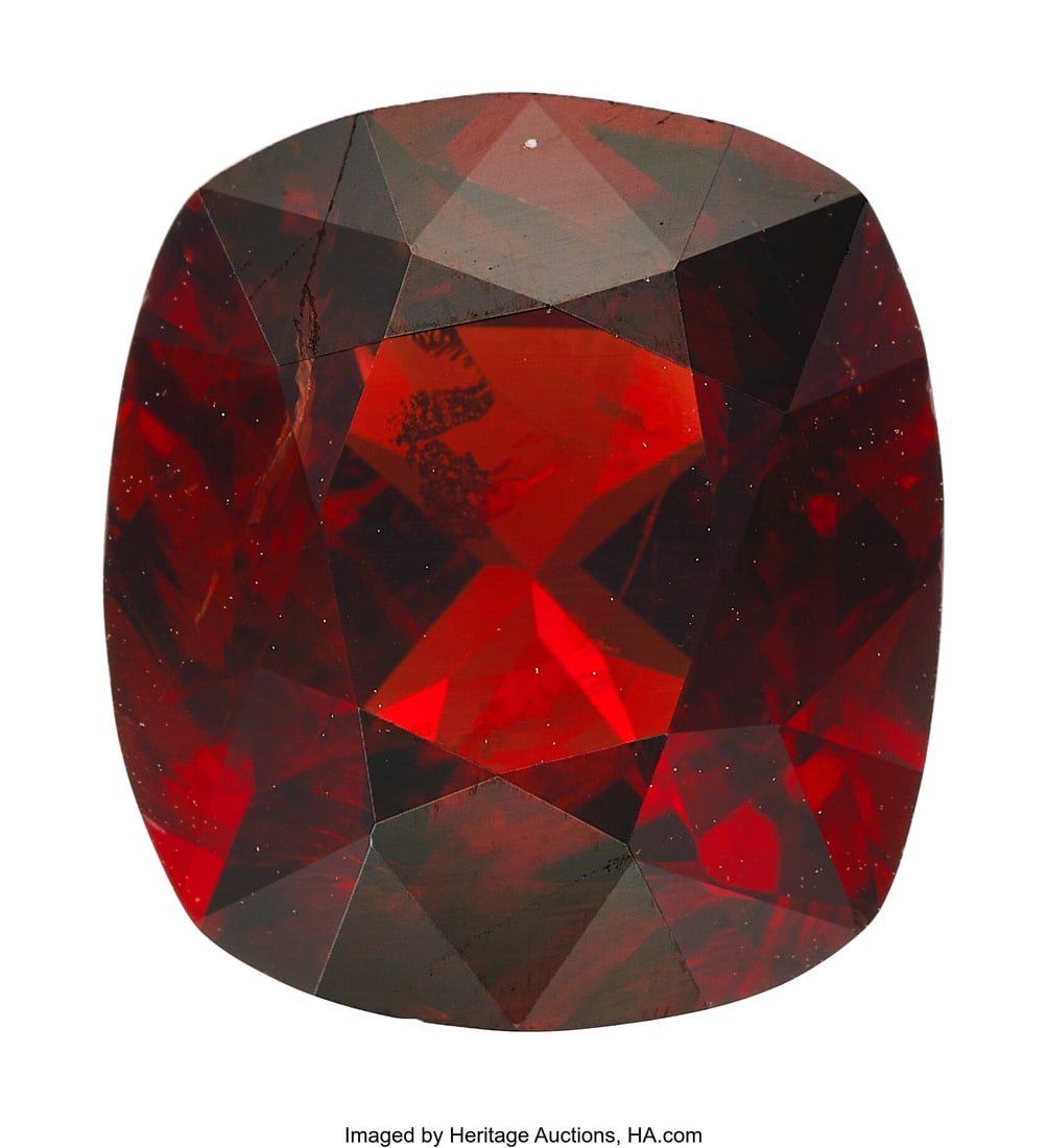 7.07 ct Burma Spinel Shape: Cushion Measurement: 7.07 ct Burma Spinel Shape: Cushion Measurements: 12.67 x 11.37 x 6.81 mm Treatment: No Indications of Heating Origin: Burma (Myanmar)