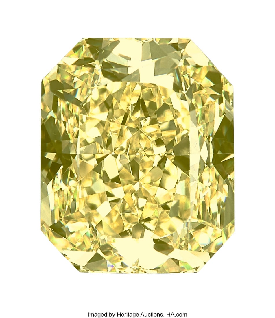 4.00 ct Fancy Intense Yellow Diamond Shape: Cut: 4.00 ct Fancy Intense Yellow Diamond Shape: Cut-cornered rectangular modified brilliant-cut Measurements: 9.58 x 7.92 x 5.65 mm Color: Fancy Intense Yello