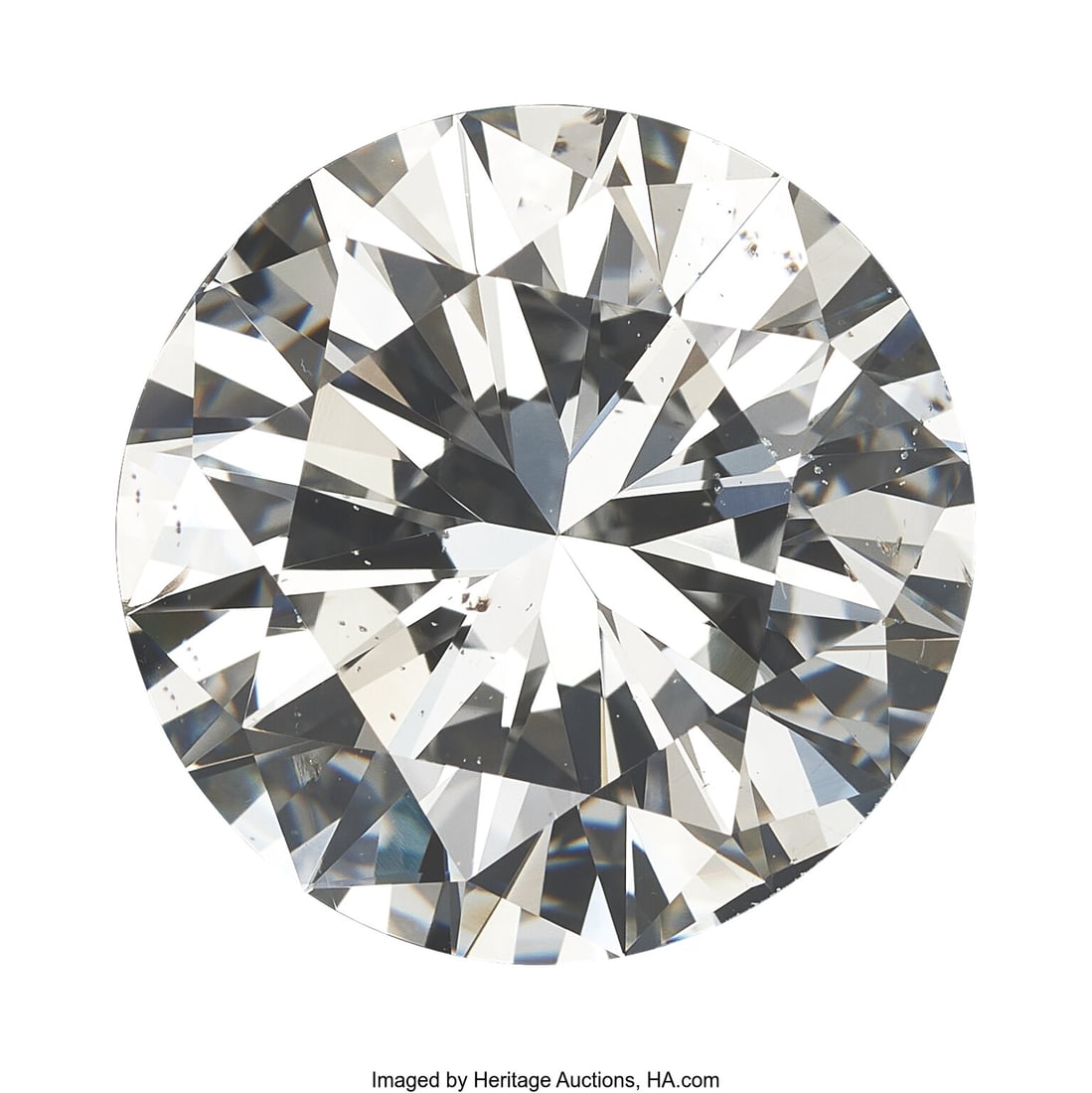 7.01 ct Diamond Shape: Round brilliant-cut Meas: 7.01 ct Diamond Shape: Round brilliant-cut Measurements: 12.39 - 12.49 x 7.53 mm Color: F Clarity SI1 Report: GIA # 6233941724 HID03101062020