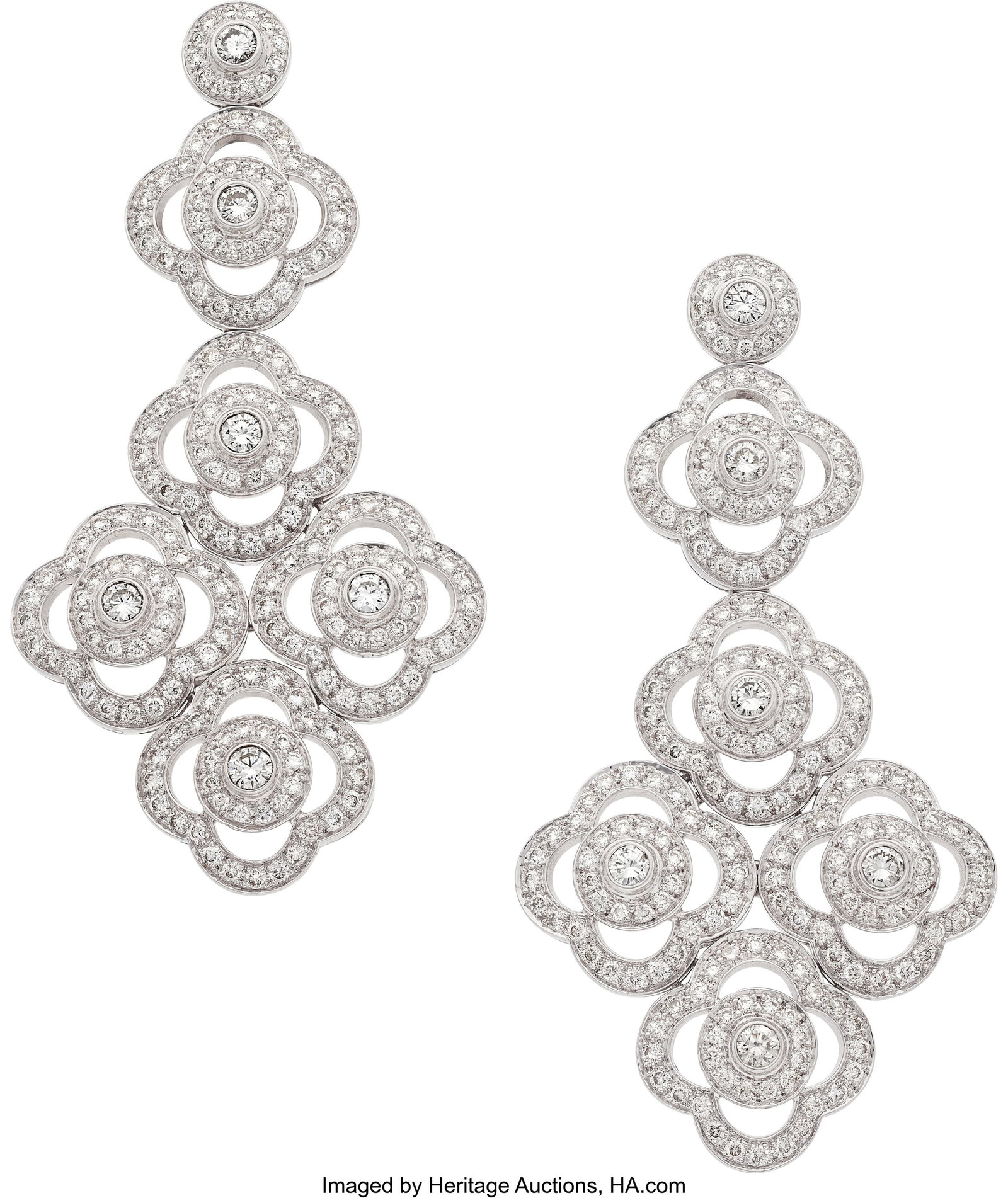 Diamond, White Gold Earrings Stones: Full-cut d: Diamond, White Gold Earrings Stones: Full-cut diamonds weighing a total of approximately 6.50 carats Metal: 18k white gold Gross Weight: 38.50 grams Dimensions&co