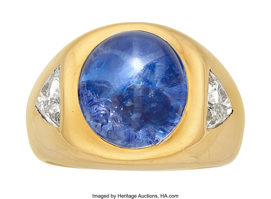 Ceylon Color-Change Star Sapphire, Diamond, Gold: Ceylon Color-Change Star Sapphire, Diamond, Gold Ring Stones: Star sapphire cabochon; triangular-shaped diamonds weighing a total of approximately 1.75 carats Metal&colon