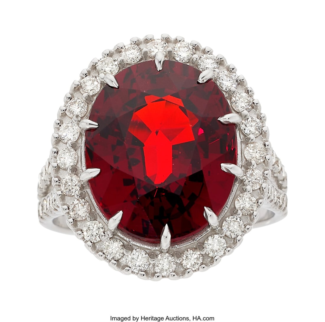 Spessartine Garnet, Diamond, White Gold Ring S: Spessartine Garnet, Diamond, White Gold Ring Stones: Oval-shaped spessartine garnet weighing 11.79 carats; full-cut diamonds weighing a total of 0.81 carat Metal&c