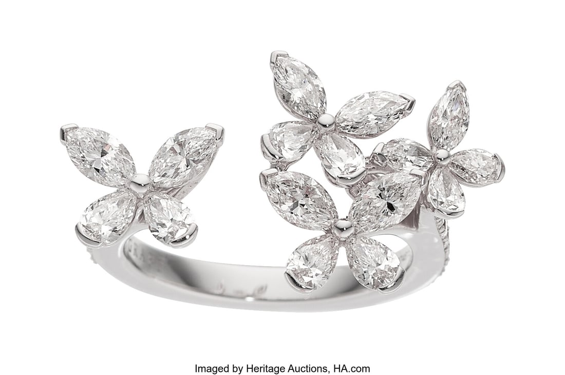 Graff Diamond, White Gold Ring Stones: Marquise: Graff Diamond, White Gold Ring Stones: Marquise-shaped diamonds weighing a total of 0.89 carat; pear-shaped diamonds weighing a total of 0.60 carat; full-cut diamon