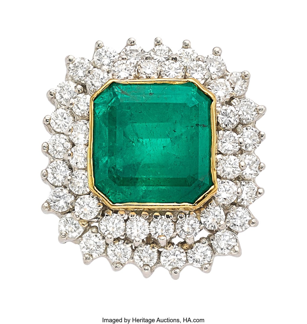 Colombian Emerald, Diamond, Platinum, Gold Ring: Colombian Emerald, Diamond, Platinum, Gold Ring, circa 1960 Stones: Octagonal-shaped emerald weighing approximately 7.75 carats; full-cut diamonds weighing a 