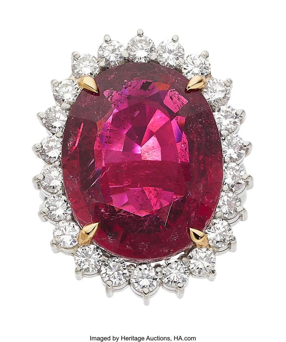 Rubellite Tourmaline, Diamond, Platinum Ring St: Rubellite Tourmaline, Diamond, Platinum Ring Stones: Oval-shaped rubellite tourmaline weighing approximately 12.25 carats; full-cut diamonds weighing a total of approxima