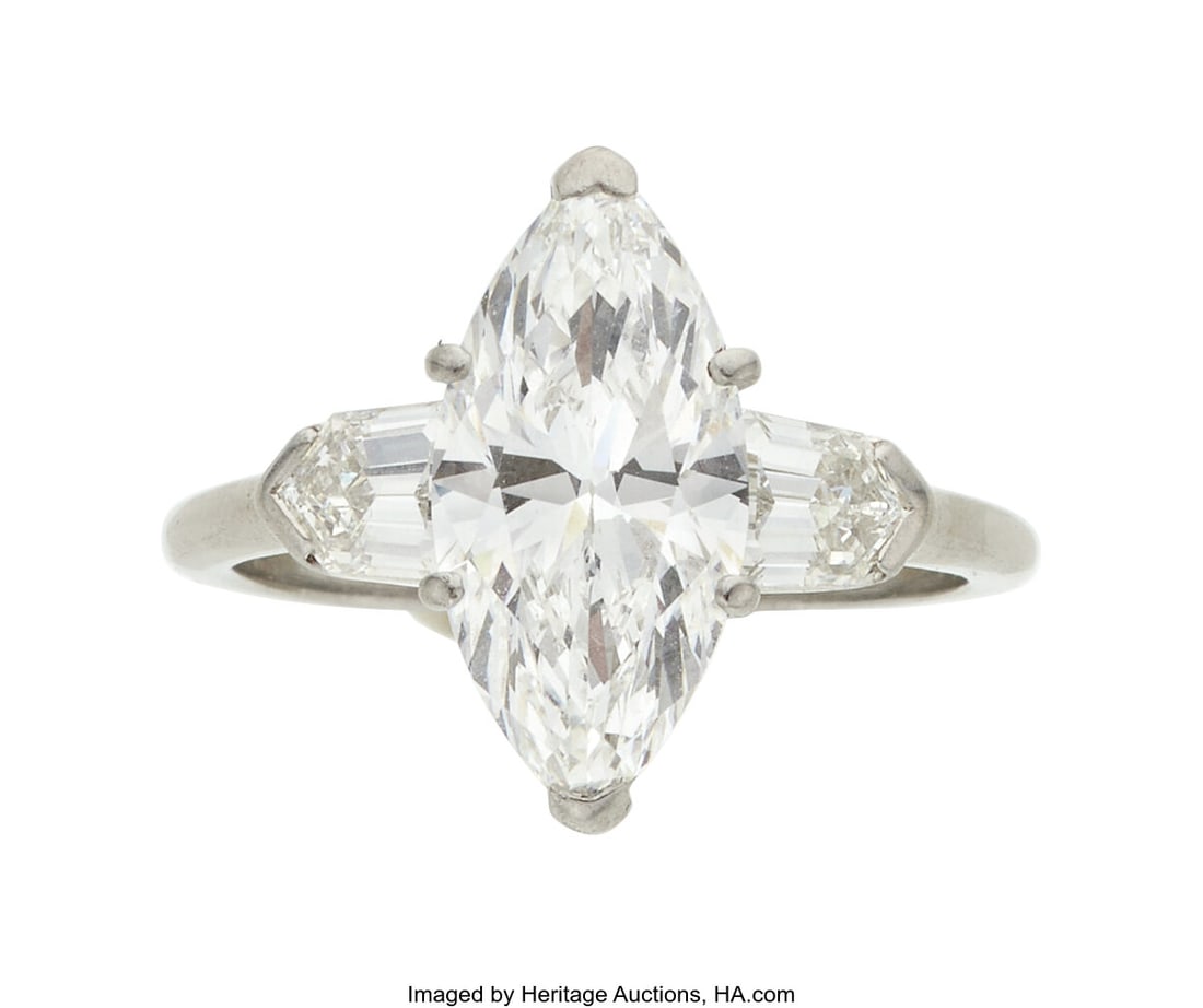 Diamond, Platinum Ring Stones: Marquise-shaped : Diamond, Platinum Ring Stones: Marquise-shaped diamond weighing 2.46 carats; bullet-shaped diamonds weighing a total of approximately 0.50 carat Metal: Platinum Gr