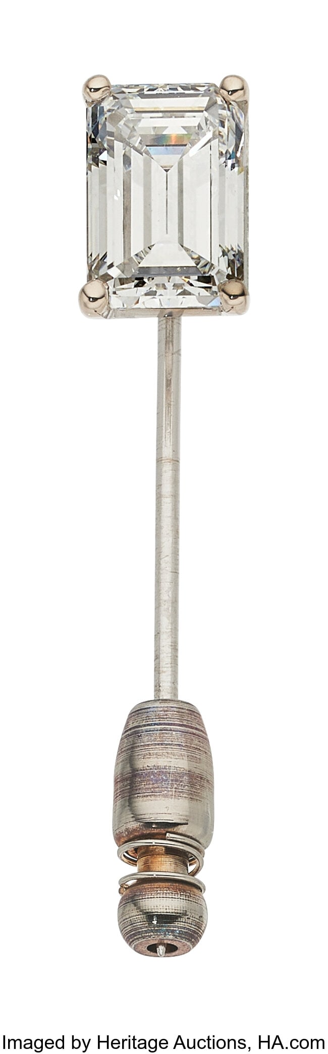 Diamond, White Gold Stickpin Stones: Emerald-cu: Diamond, White Gold Stickpin Stones: Emerald-cut diamond weighing 2.69 carats Metal: 14k white gold Gross Weight: 1.80 grams Dimensions: 1-7/16 inches x
