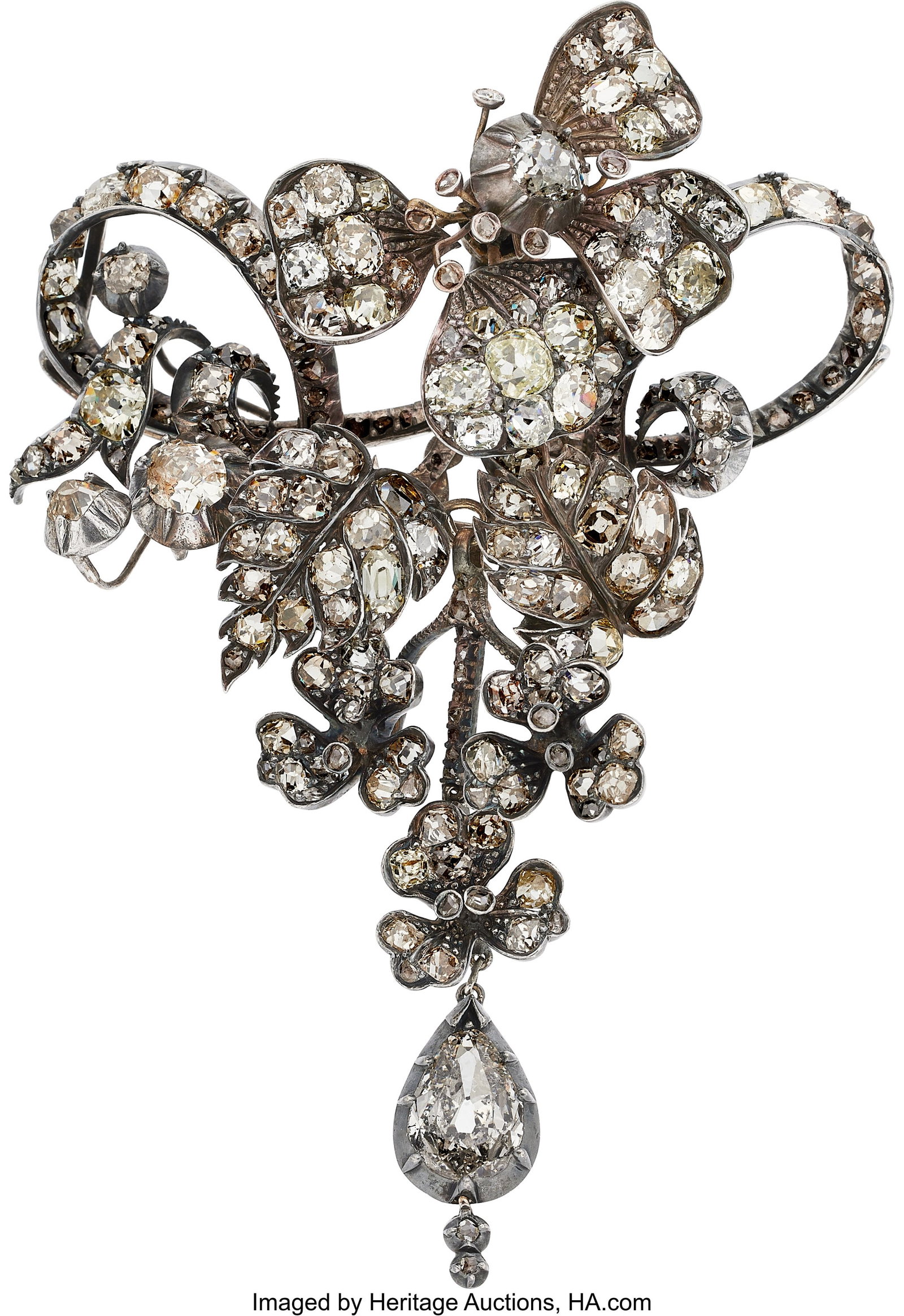 Victorian Diamond, Silver Convertible Brooch St: Victorian Diamond, Silver Convertible Brooch Stones: Pear-shaped diamond weighing approximately 1.15 carats; oval-shaped and mine-cut diamonds weighing a total of approximately