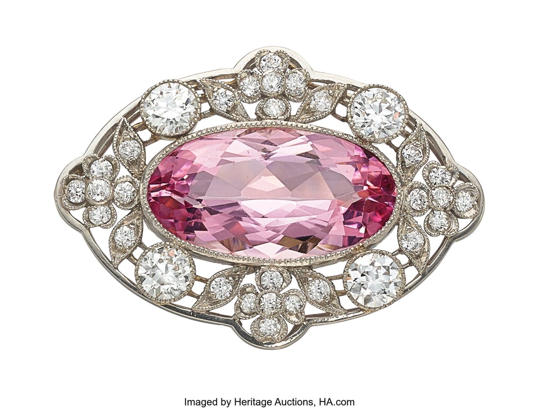 Belle Époque Morganite, Diamond, Platinum Brooc: Belle Époque Morganite, Diamond, Platinum Brooch Stones: Oval-shaped morganite weighing approximately 7.00 carats; European-cut diamonds weighing a total of approx