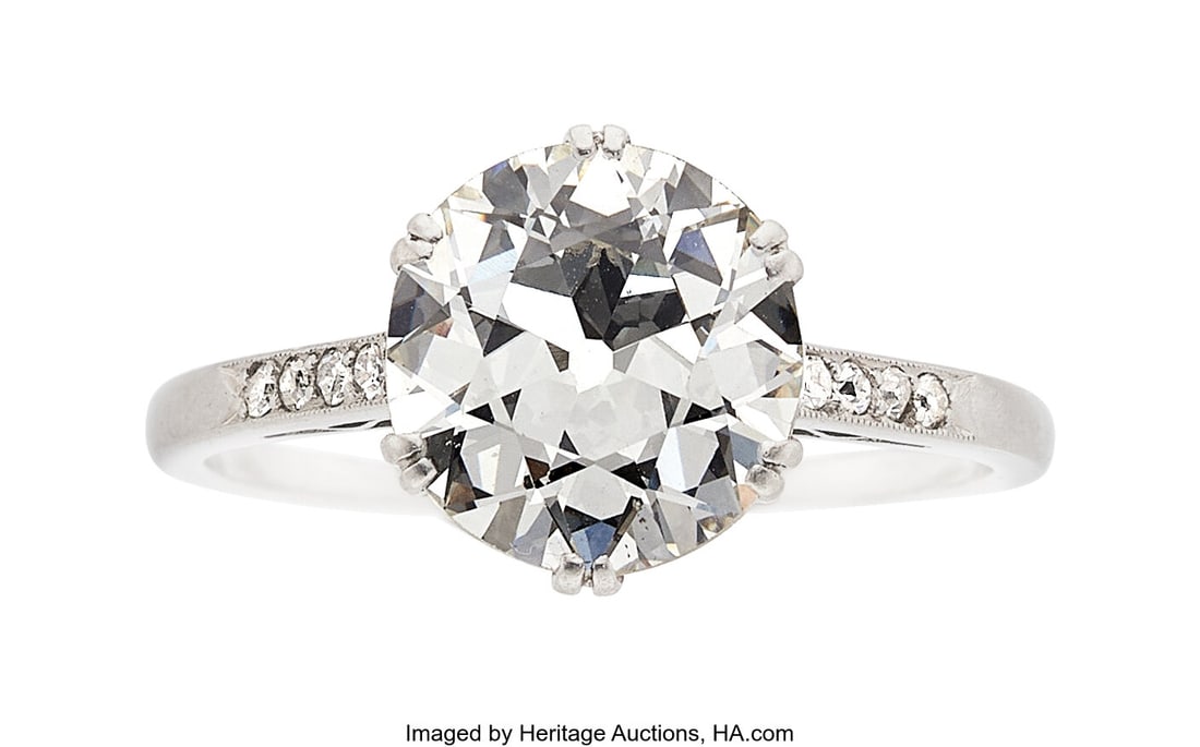 Art Deco Diamond, Platinum Ring Stones: Europea: Art Deco Diamond, Platinum Ring Stones: European-cut diamond weighing 2.99 carats; single-cut diamonds Metal: Platinum Gross Weight: 3.70 grams Size: 7