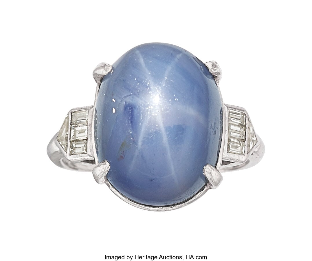 Ceylon Star Sapphire, Diamond, Platinum Ring St: Ceylon Star Sapphire, Diamond, Platinum Ring Stones: Star sapphire cabochon; baguette-cut diamonds weighing a total of approximately 0.20 carat; triangular-shaped di