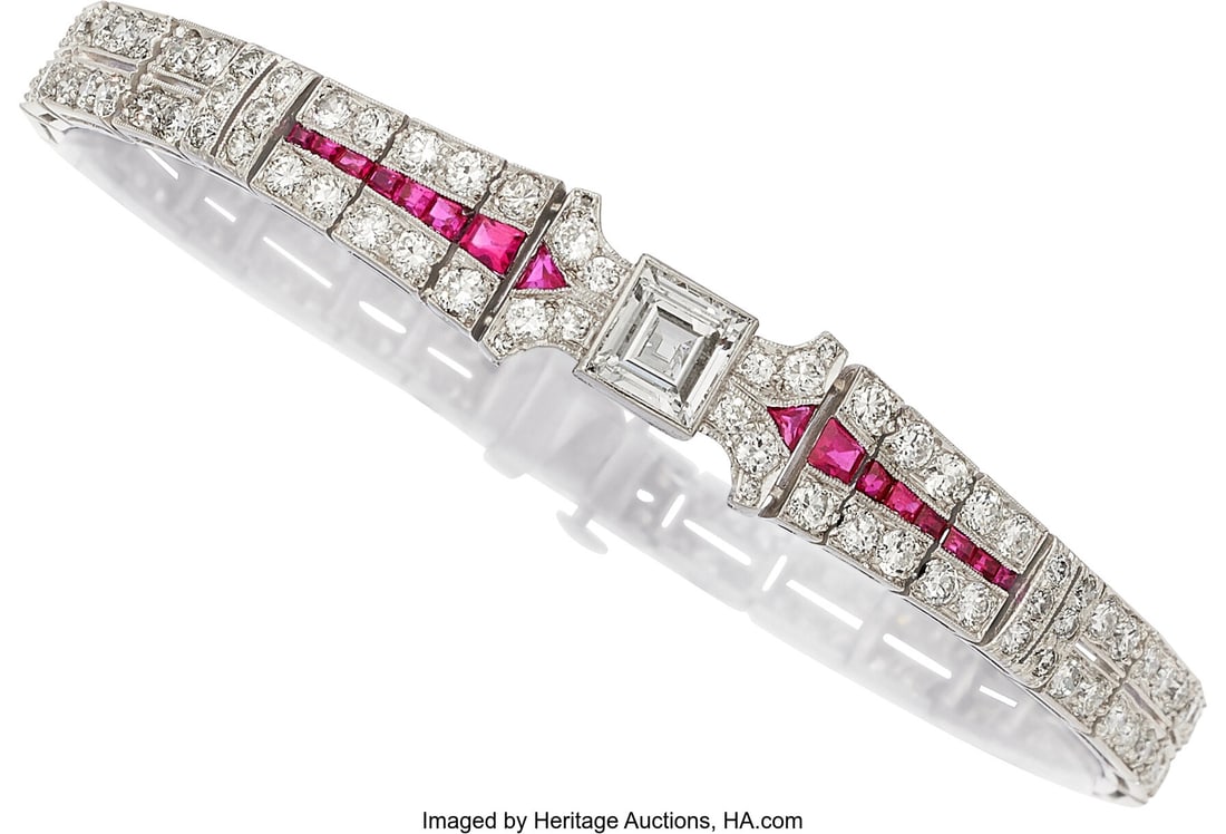 Art Deco Diamond, Ruby, Platinum Bracelet Stone: Art Deco Diamond, Ruby, Platinum Bracelet Stones: Square-shaped diamond weighing approximately 0.90 carat; full and single-cut diamonds weighing a total of approximately 