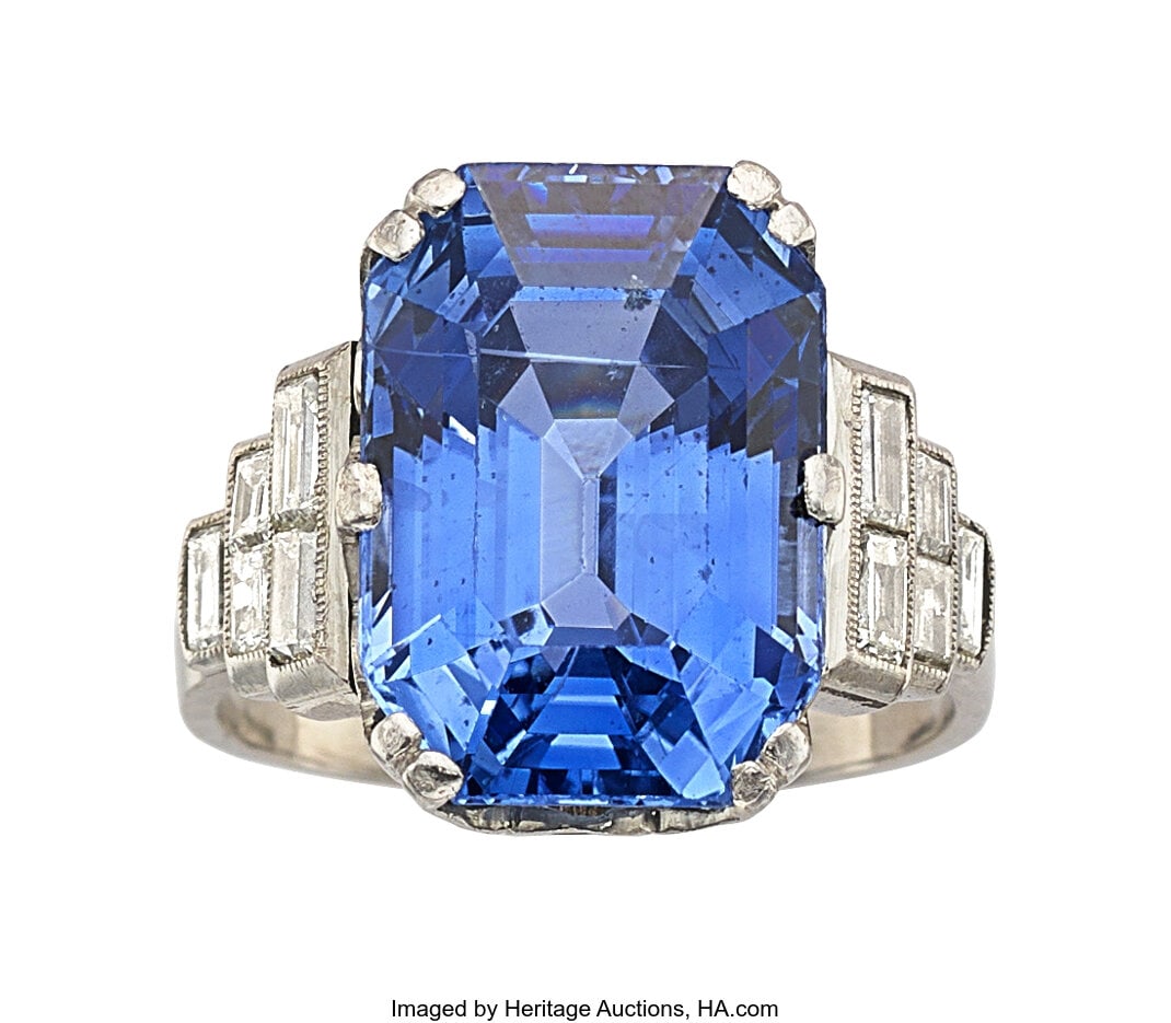 Art Deco Ceylon Sapphire, Diamond, Platinum Ring: Art Deco Ceylon Sapphire, Diamond, Platinum Ring Stones: Octagonal-shaped sapphire weighing approximately 12.00 carats; baguette-cut diamonds weighing a total of approxim