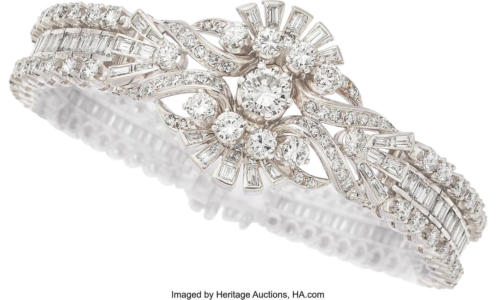 Diamond, Platinum Bracelet, circa 1950 Stones: : Diamond, Platinum Bracelet, circa 1950 Stones: Round brilliant-cut diamond weighing approximately 1.00 carat; full and single-cut diamonds weighing a total of