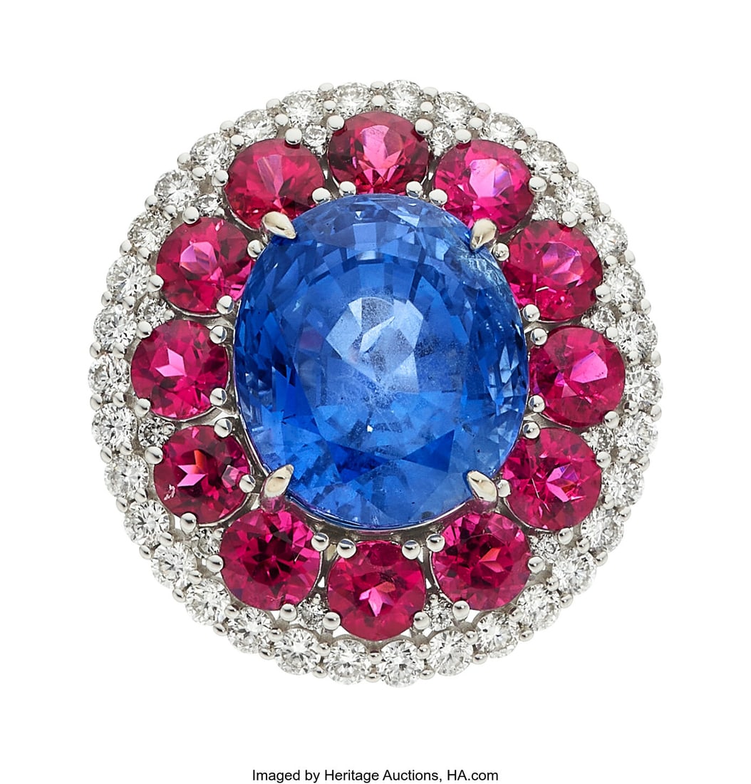 Ceylon Sapphire, Diamond, Tourmaline, White Gol: Ceylon Sapphire, Diamond, Tourmaline, White Gold Ring Stones: Oval-shaped sapphire weighing 14.11 carats; round-shaped tourmalines weighing a total of 3.23 c