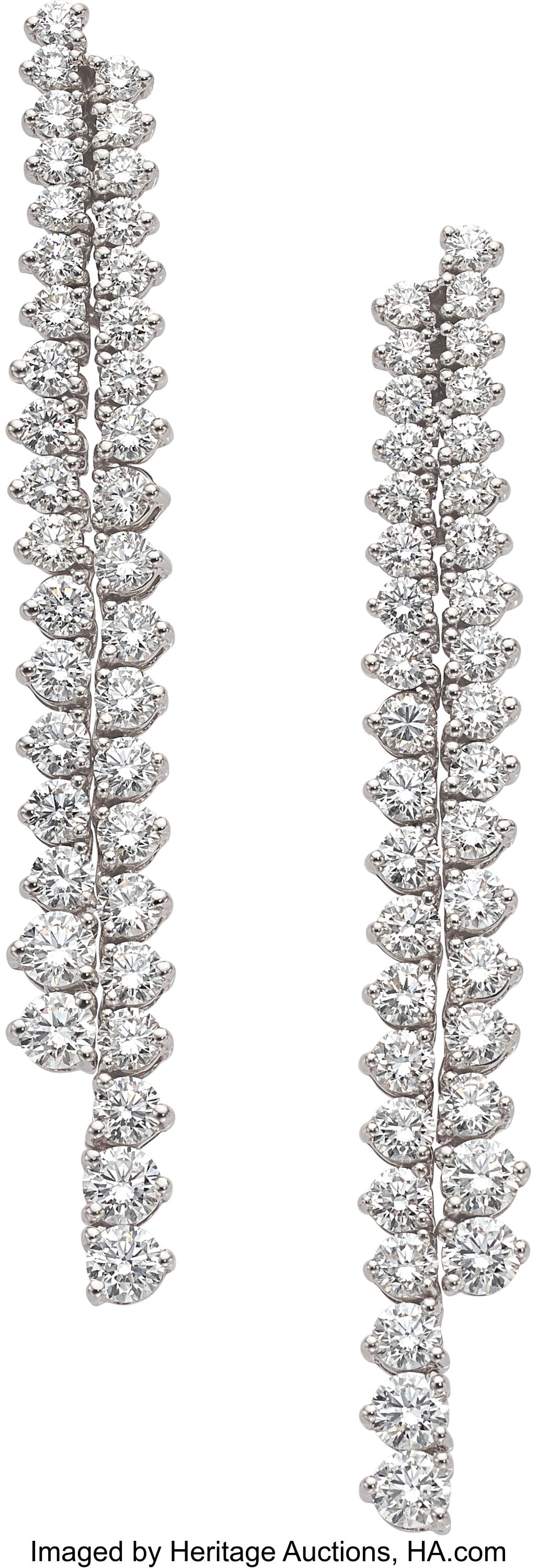 Diamond, White Gold Earrings Stones: Full-cut : Diamond, White Gold Earrings Stones: Full-cut diamonds weighing a total of 6.82 carats Metal: 18k white gold Gross Weight: 12.80 grams Dimensions: 2-7/1