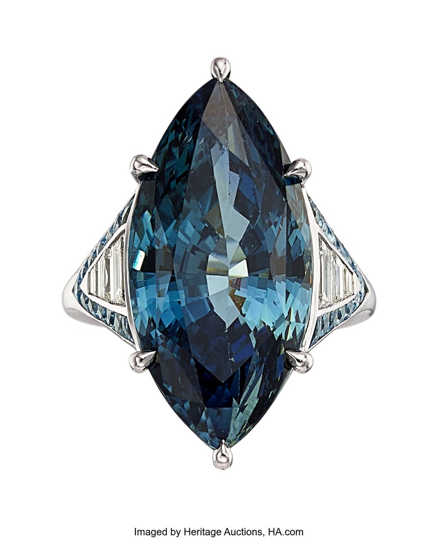 Sabrina Sapphire, Aquamarine, Diamond, Platinum : Sabrina Sapphire, Aquamarine, Diamond, Platinum Ring Stones: Marquise-shaped sapphire weighing 19.83 carats; calibré-cut aquamarines weighing a total of 0&pe