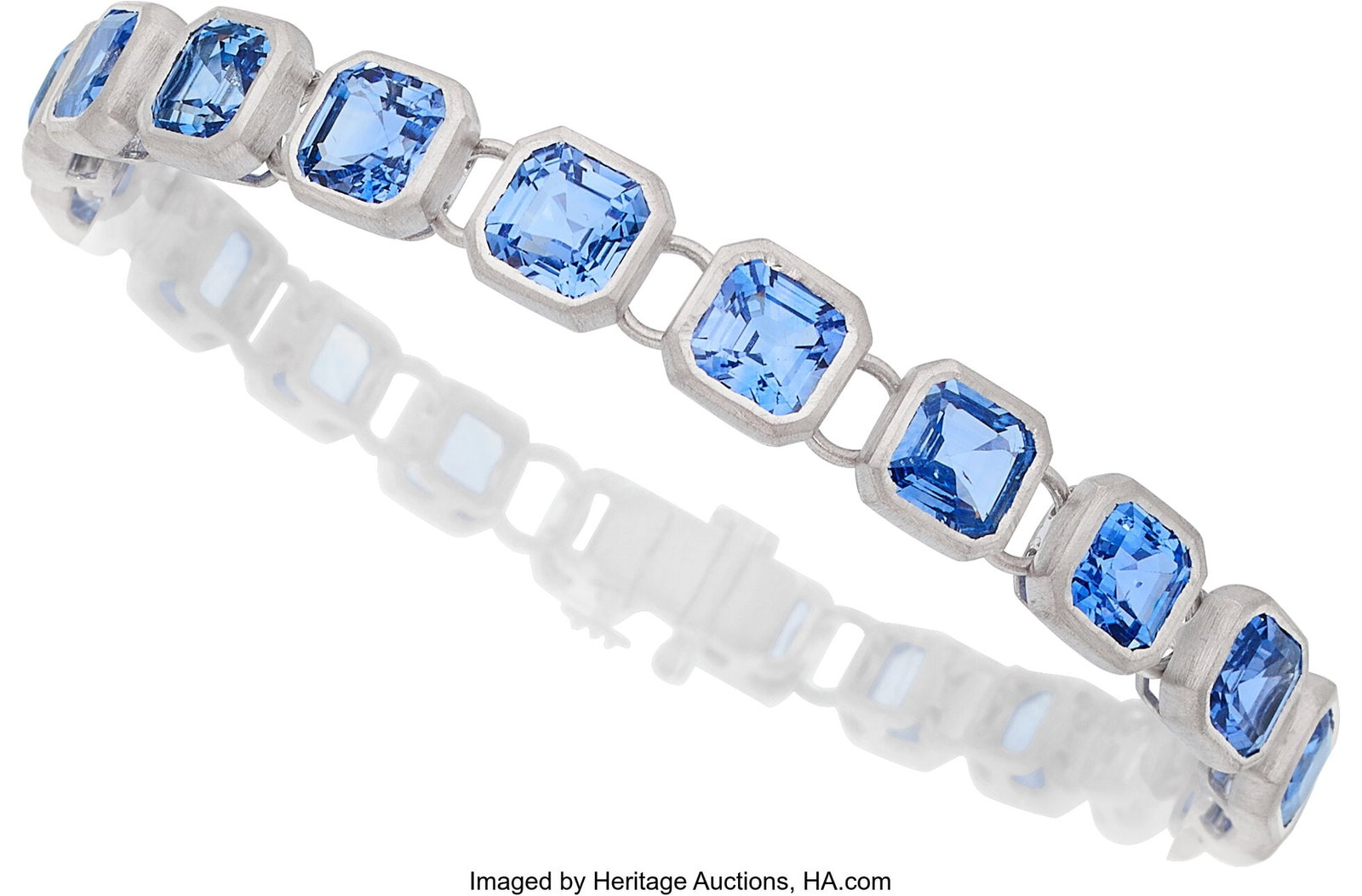Sapphire, White Gold Bracelet Stones: Octagona: Sapphire, White Gold Bracelet Stones: Octagonal-shaped sapphires weighing a total of approximately 23.00 carats Metal: 14k white gold Gross Weight: 21.50 grams Di