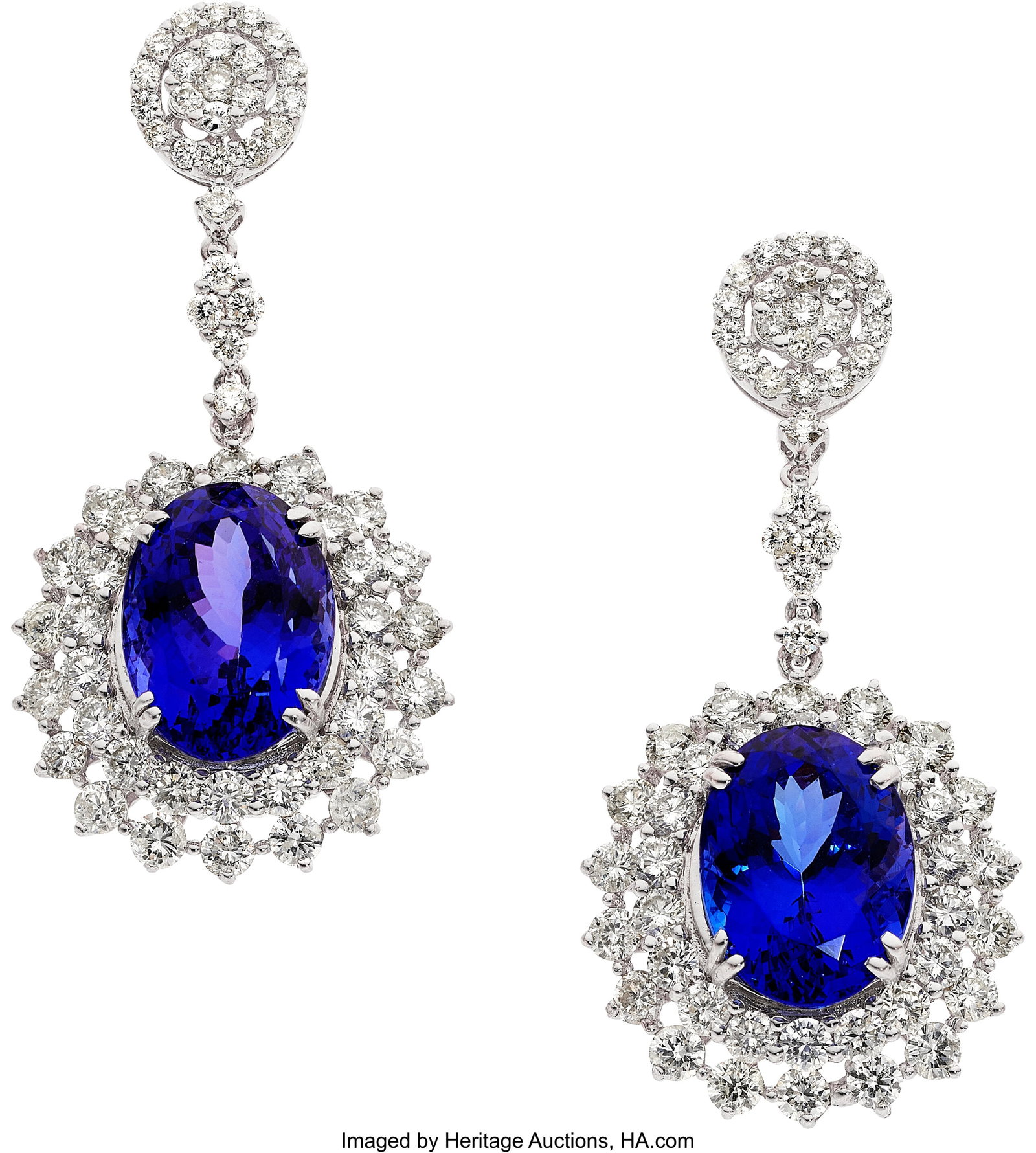 Tanzanite, Diamond, White Gold Earrings Stones:: Tanzanite, Diamond, White Gold Earrings Stones: Oval-shaped tanzanites weighing a total of 14.96 carats; full-cut diamonds weighing a total of 5.74 carats Metal&co