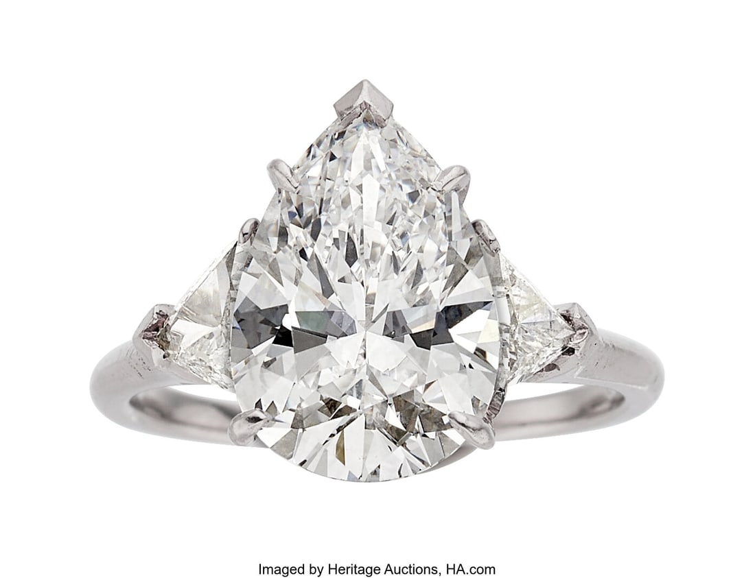 Jacques Timey for Harry Winston Diamond, Platinu: Jacques Timey for Harry Winston Diamond, Platinum Ring Stone: Pear-shaped diamond weighing 3.05 carats; triangular-shaped diamonds weighing a total of approximately 0.70