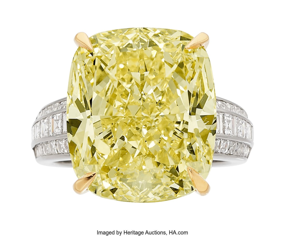 Pragnell Fancy Yellow Diamond, Diamond, Platinu: Pragnell Fancy Yellow Diamond, Diamond, Platinum, Gold Ring, English Stones: Cushion-shaped fancy yellow diamond weighing 22.09 carats; French and carré