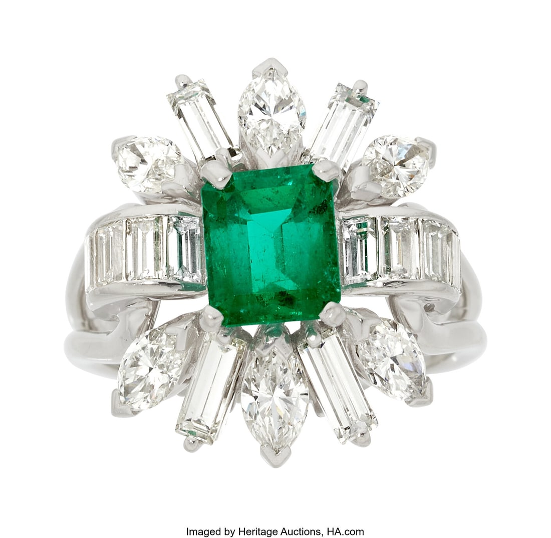 Colombian Emerald, Diamond, Platinum Ring Stone: Colombian Emerald, Diamond, Platinum Ring Stones: Octagonal-shaped emerald weighing approximately 1.30 carats; marquise-shaped diamonds weighing a total of approximately 