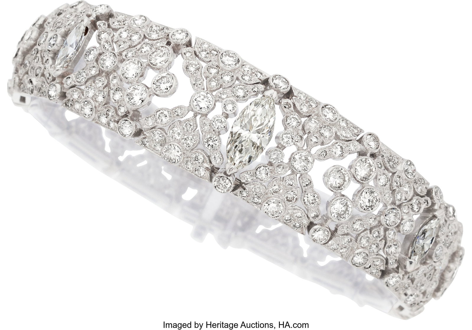Diamond, White Gold Bracelet Stones: Marquise-s: Diamond, White Gold Bracelet Stones: Marquise-shaped diamonds weighing a total of approximately 1.85 carats; full-cut diamonds weighing a total of approximately 7.10 car