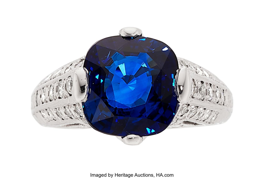 Ceylon Sapphire, Diamond, Platinum Ring Stones:: Ceylon Sapphire, Diamond, Platinum Ring Stones: Cushion-shaped sapphire weighing 5.13 carats; full-cut diamonds weighing a total of approximately 0.25 carat Metal&