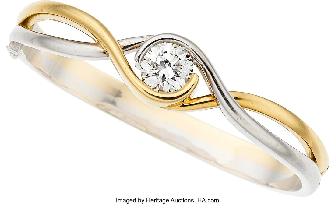 Diamond, Gold Bracelet Stones: Round brilliant: Diamond, Gold Bracelet Stones: Round brilliant-cut diamond weighing 3.03 carats Metal: 14k white and yellow gold Gross Weight: 43.60 grams Dimensions: 6-1&s