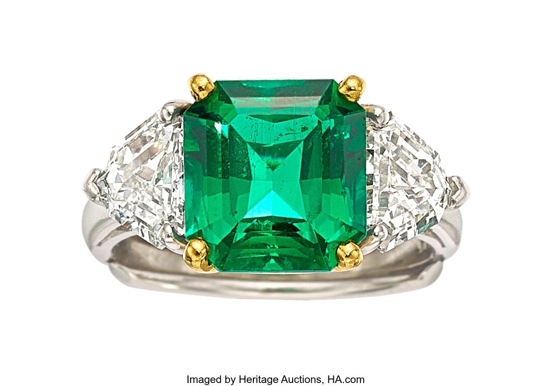 Oscar Heyman Zambian Emerald, Diamond, Platinum: Oscar Heyman Zambian Emerald, Diamond, Platinum, Gold Ring Stones: Octagonal-shaped emerald weighing approximately 4.60 carats; shield-shaped diamonds weighing a to