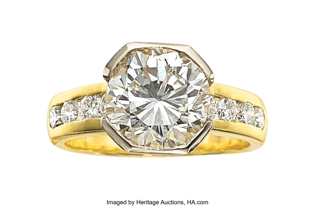 Diamond, Gold Ring Stones: Round brilliant-cut : Diamond, Gold Ring Stones: Round brilliant-cut diamond weighing 3.46 carats; full-cut diamonds weighing a total of approximately 0.45 carat Metal: 18k gold Gross W