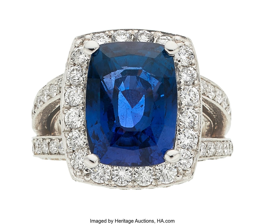 Color-Change Sapphire, Diamond, White Gold Ring : Color-Change Sapphire, Diamond, White Gold Ring Stones: Cushion-shaped sapphire weighing 12.74 carats; full-cut diamonds weighing a total of approximately 3.60 car