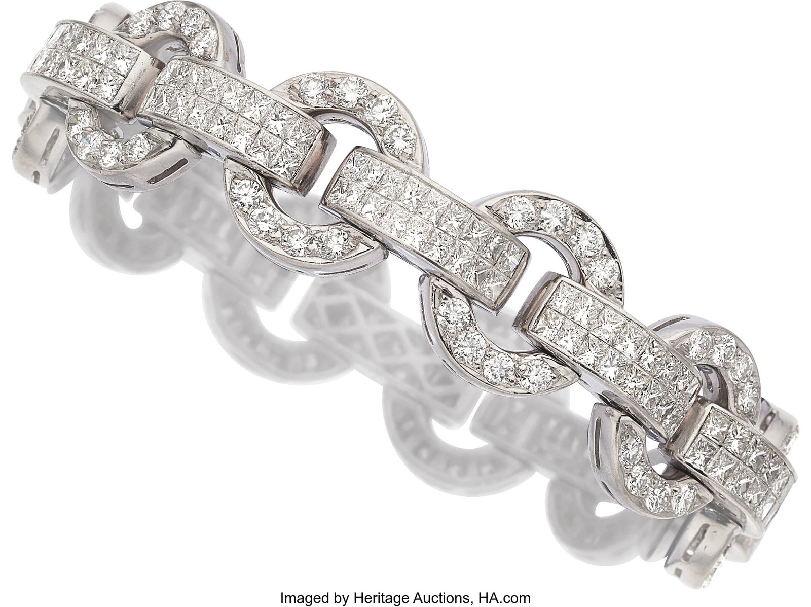 Diamond, Platinum Bracelet Stones: Square-shape: Diamond, Platinum Bracelet Stones: Square-shaped diamonds weighing a total of approximately 11.00 carats; full-cut diamonds weighing a total of approximately 4.75