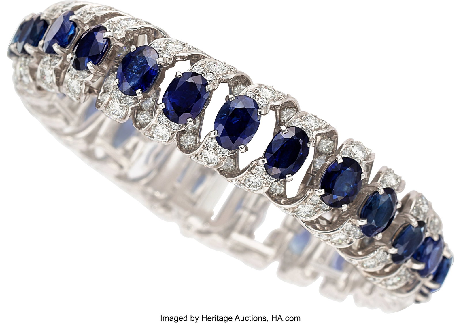 Sapphire, Diamond, Platinum Bracelet Stones: Ov: Sapphire, Diamond, Platinum Bracelet Stones: Oval-shaped sapphires weighing a total of approximately 30.00 carats; full-cut diamonds weighing a total of approximately 12&